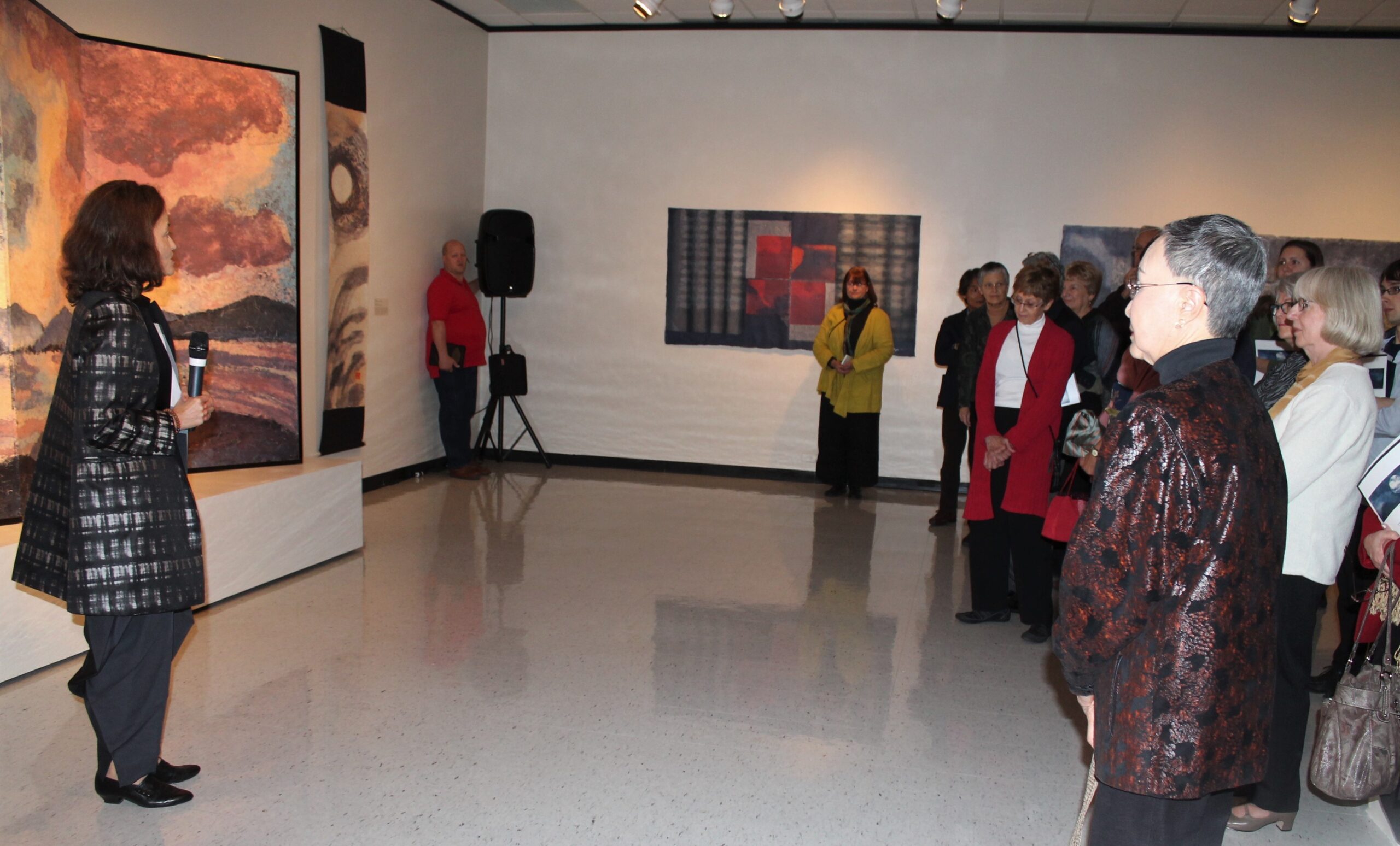 Sarah Brayer at the exhibit opening for Between Two Worlds, 2014
