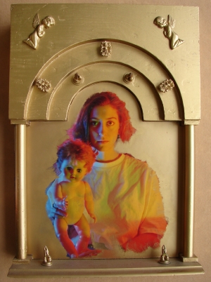 Portrait of woman and baby doll