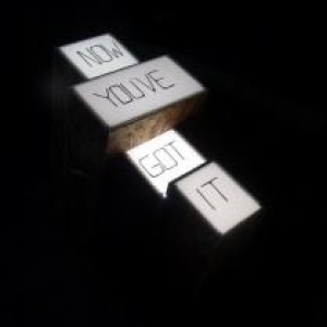 Tom Hughes, Got it, 2009, enamel on acrylic, particle board and fluorescent lights.